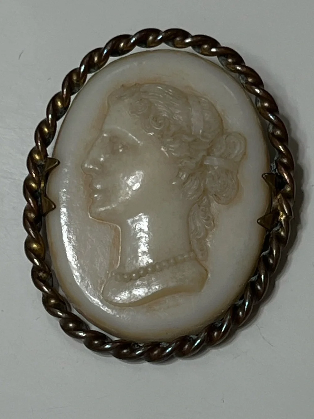 Vintage Ivory Colored Cameo Brooch in Twisted Gold-tone Frame
